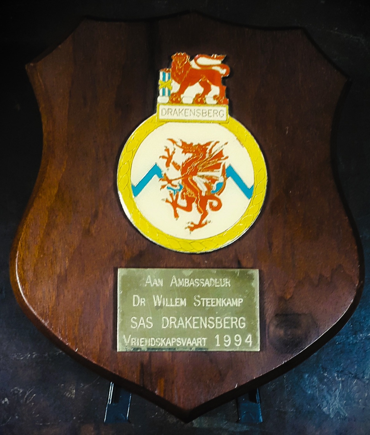 Nongqai Blog Th SAS Drakensberg crew presented Amb Steenkamp with this commemorative shield, for the arrangements and efforts made by South Africa’s regional embassy (based in Libreville, Gabon) to ensure that the Gulf of Guinea part of their 1994 Friendship Cruise was both enjoyable and a diplomatic success, showing the flag where it had not been seen before.